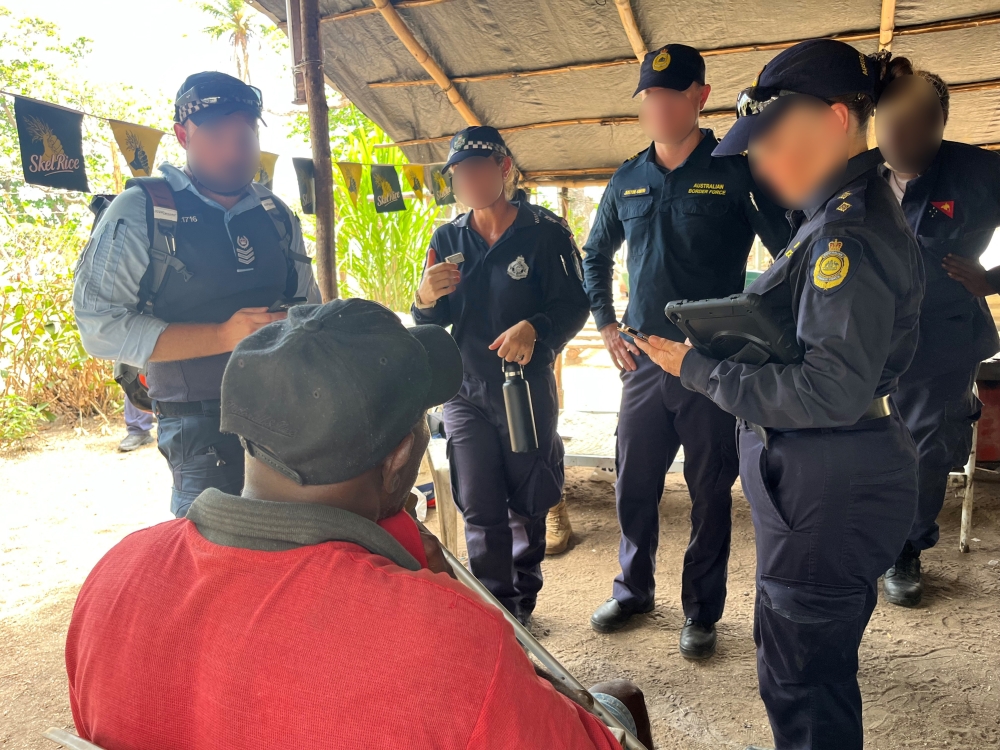 Media_Law enforcement speak to an alleged criminal