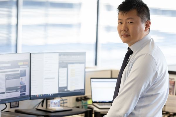 AFP member working at a desk