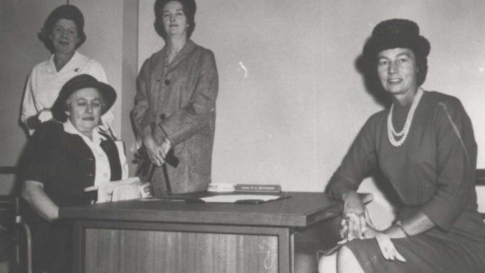 Circa 1957 - Senior Constable Alice Clarke, the first ACT Policewoman, flanked by Constable Joan Coleman (standing left), Constable Robyn Davidson (standing right) and Sergeant Gladys Johnson (seated right) AFPMRN368 