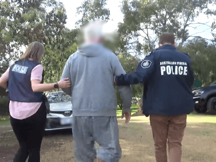 AFP officers escorted arrested man