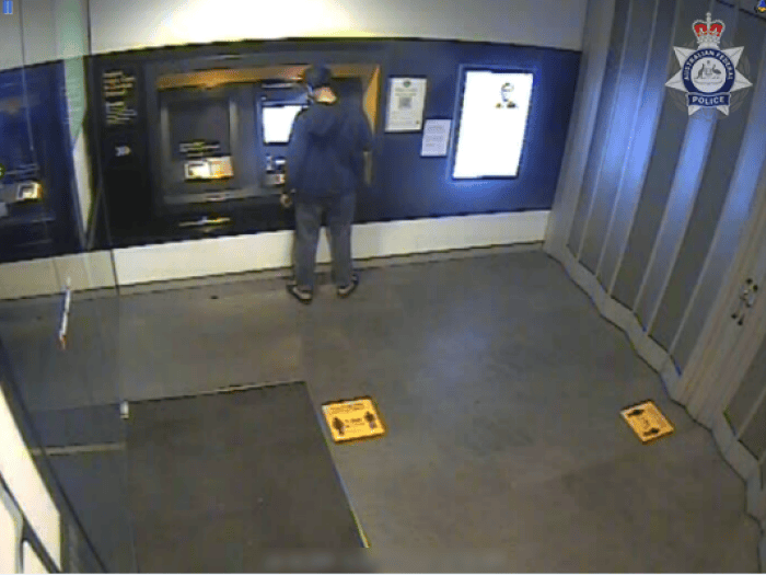 Man withdrawing money from ATM