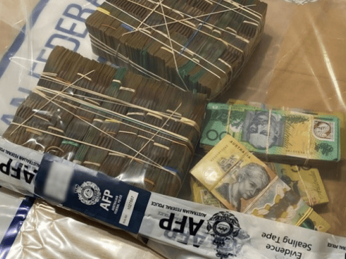 Photos of cash in evidence bag