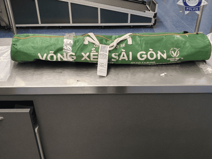 Man allegedly concealed heroin importation in camp stretcher at Sydney Airport