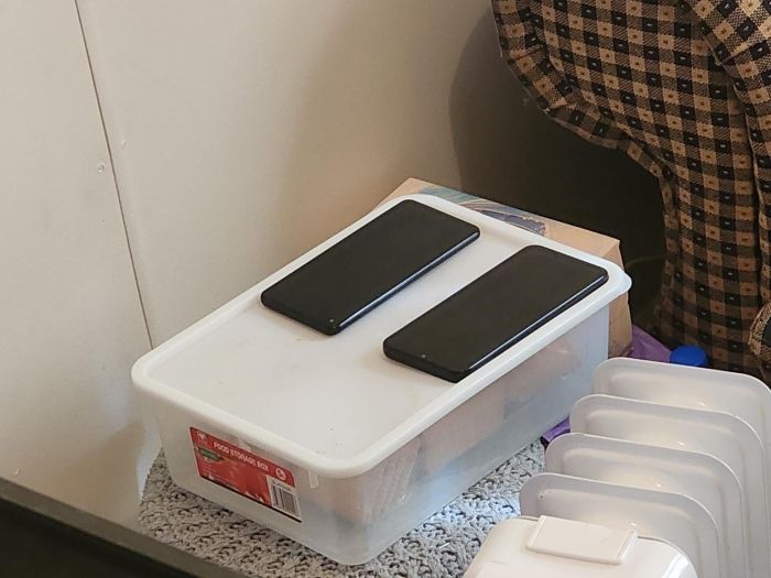 An image of two mobile phones seized during a search warrant 