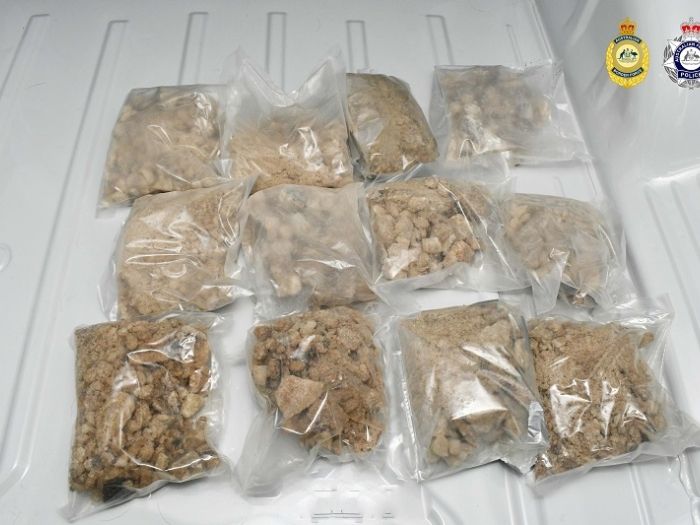 Image of bags of MDMA on a white table 