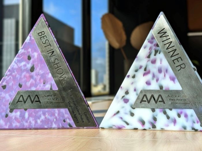Trophies for the website awards, Best in Show and winner of the drupal category 2024
