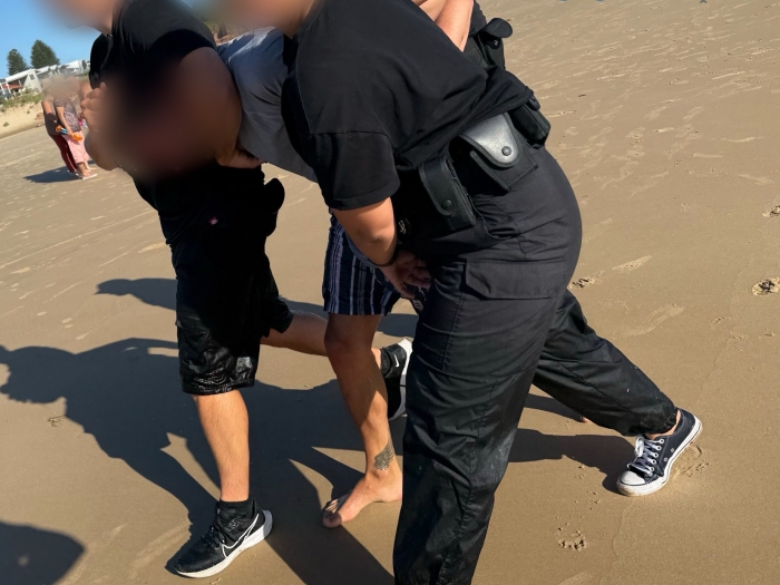 Man arrested at beach