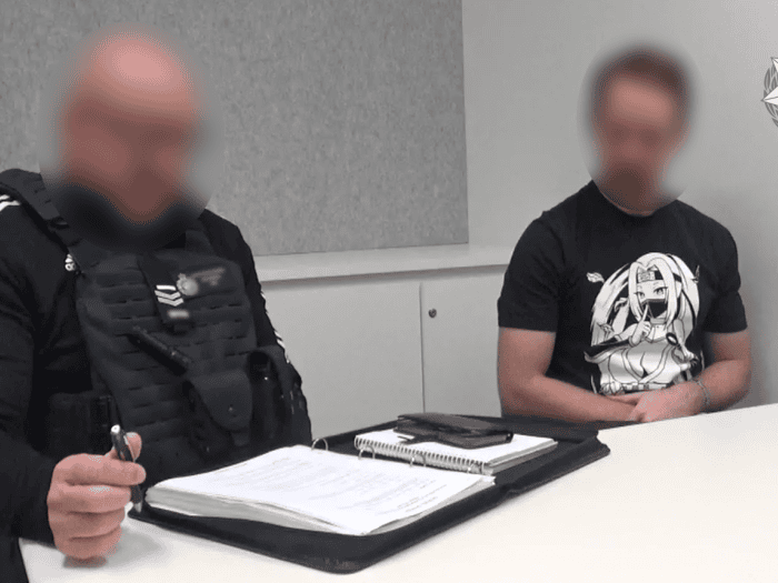 AFP investigator interviewing the accused man.