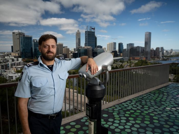 AFP Officer overlooking WA leaning on a view finder