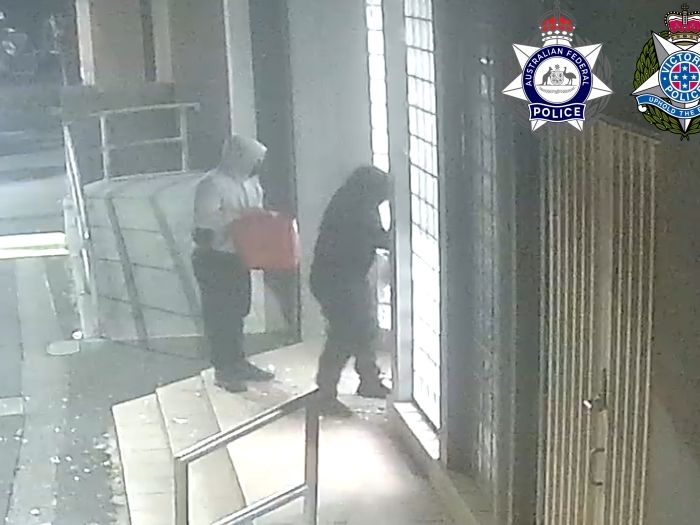 CCTV still of two suspects