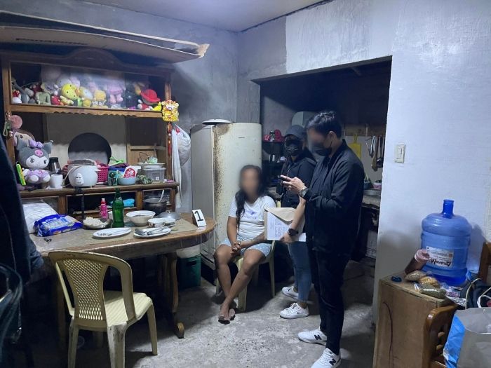 A person is questioned by Philippines National Police