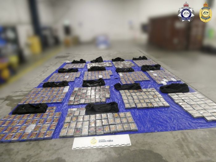 Hundreds of blocks of cocaine laid out on floor