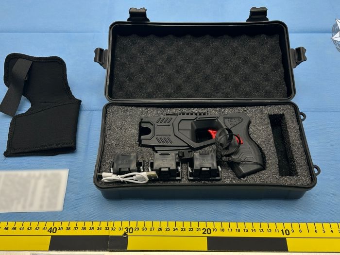 man charged over taser import