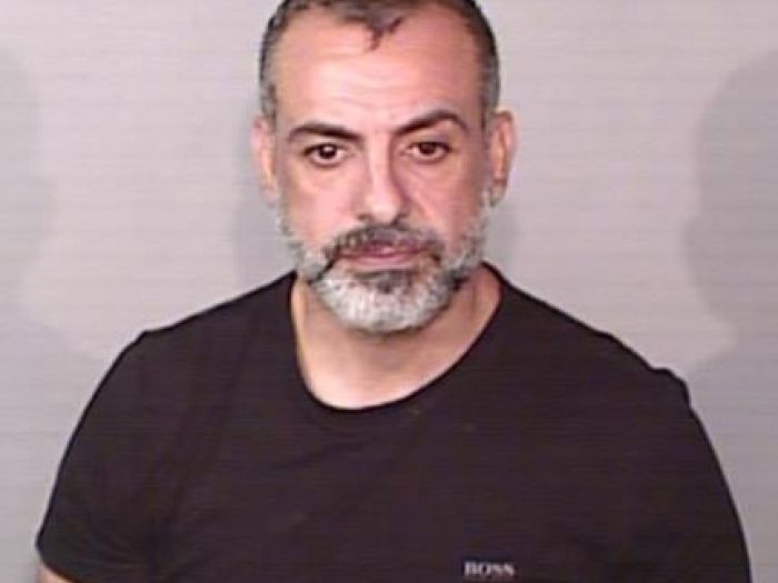AFP release photo of man wanted for breach of parole