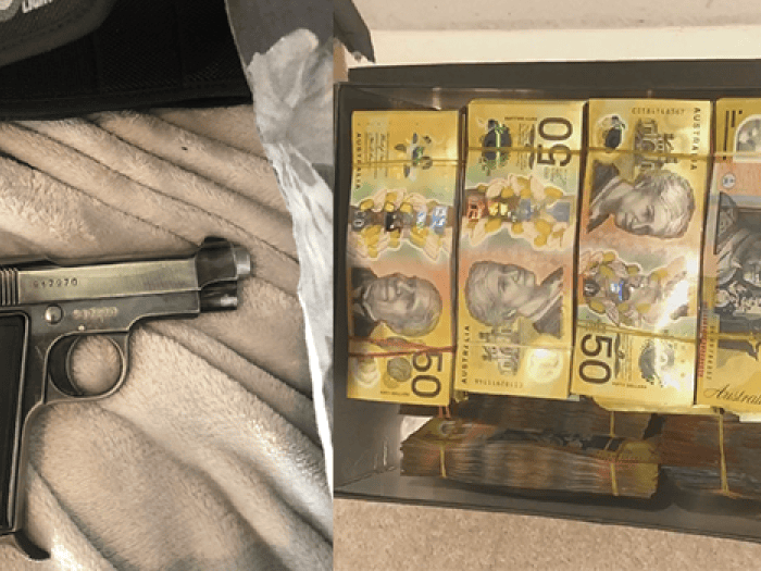 baretta pistol and australian currency