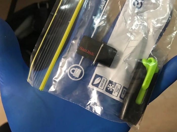 Two USBs seized during search warrants