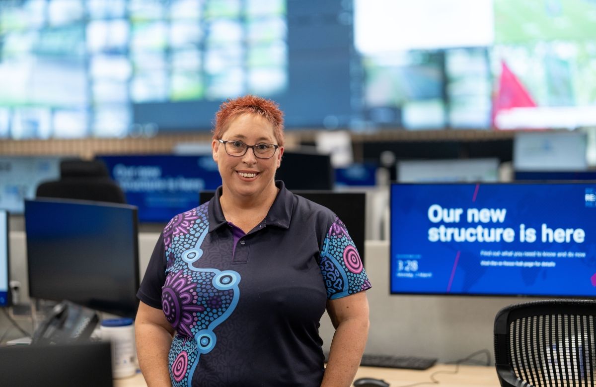 First Nations Pathway person in front of monitors