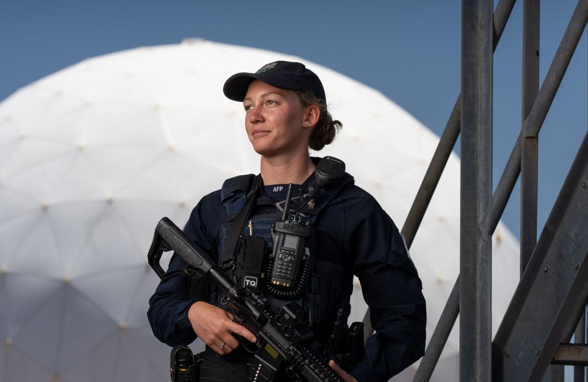 A female officer standing at Geraldton site.