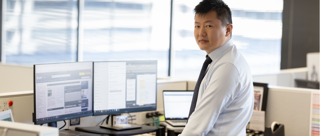 AFP member working at a desk