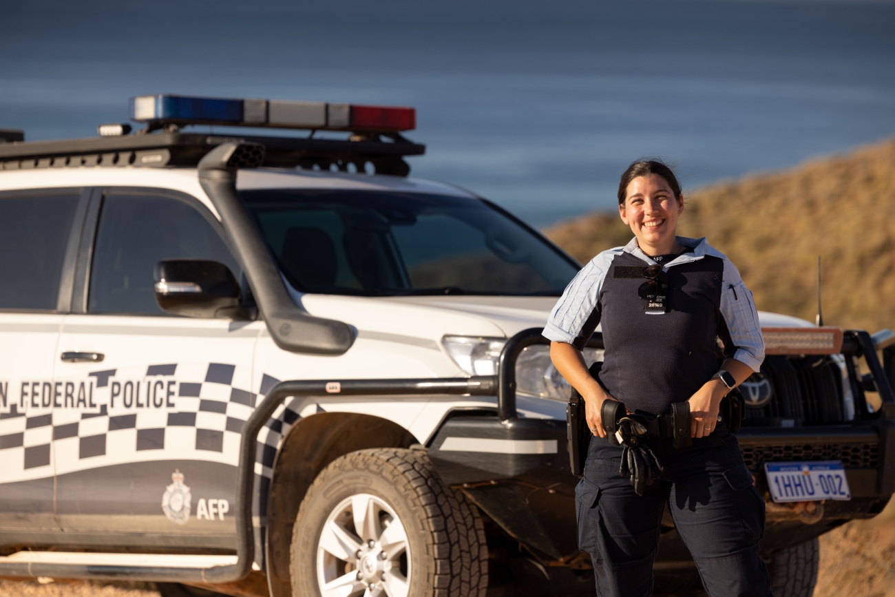 PSO in front of an AFP branded four wheel drive