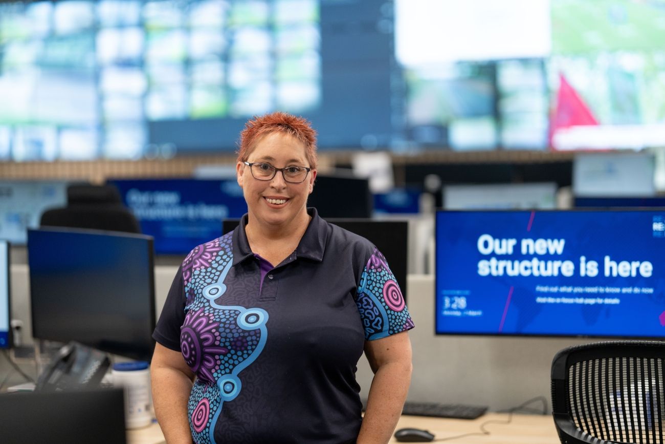 First Nations Pathway person in front of monitors