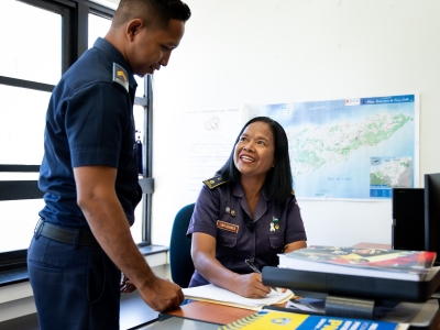 Timor-Leste police officers in a police station working