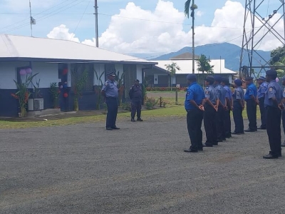 Assistant Commissioner addressing official parade at headquarters opening