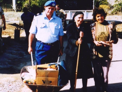 As part of the United Nations Peacekeeping Force in Cyprus (UNFICYP), Australian police assisted in delivering supplies to members of minority Greek Cypriot communities situated in the so-called Turkish Republic of Northern Cyprus. Here, a wheelbarrow was used as the woman lived atop a steep hill