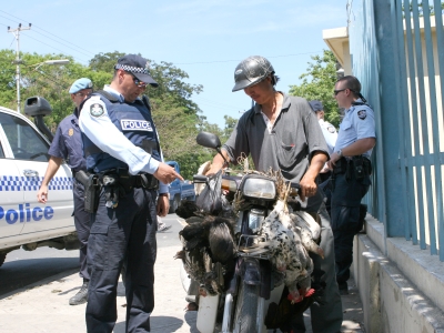 Australian and international police on the streets in Dili, Timor-Leste, in the wake of chaos and violence in 2006. International police and military forces assisted Timorese authorities in restoring order and calm, after a near total collapse in security due to violence between Timorese military and police forces.