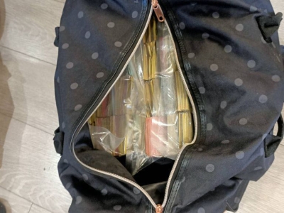 Two women and a man have each been charged with possessing stolen or unlawfully obtained property after police allegedly intercepted a cash handover at a Perth business on 21 May 2021